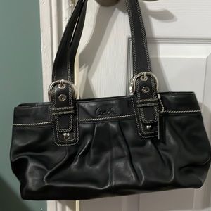 Medium sized Coach purse.